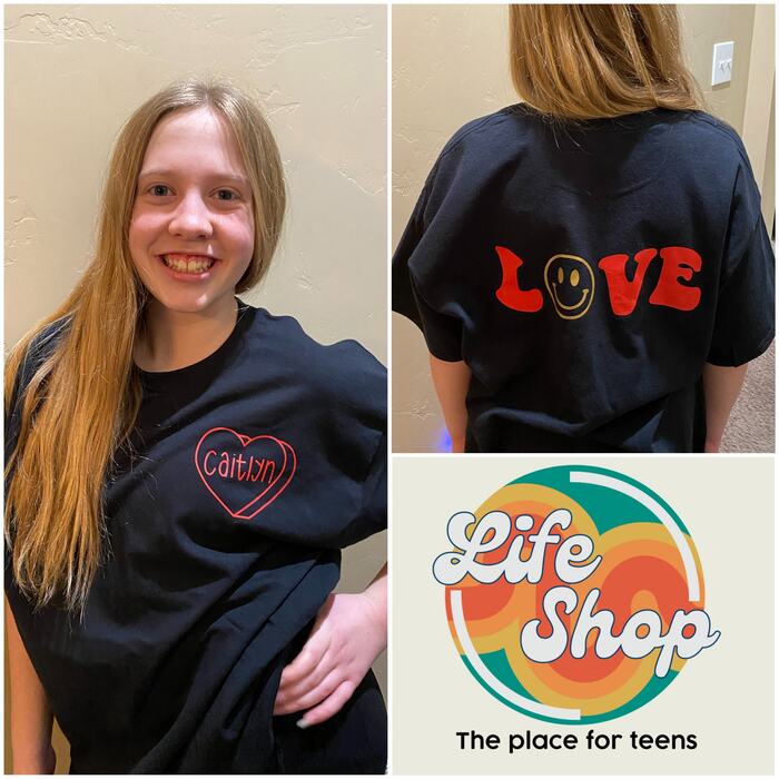 A teen wearing a Life Shop tee customised with her own name, and LOVE on the back