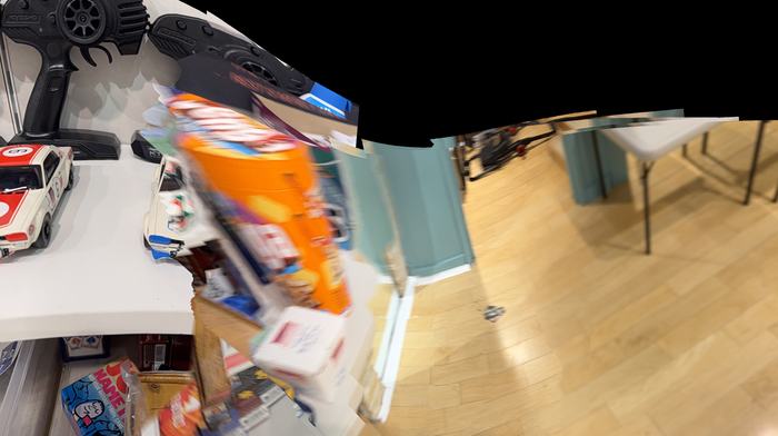 The RC shelf with boxed Kyosho Mini-Z kits underneath